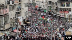 اردن میں فلسطینیوں کے ساتھ یک جہتی کا ایک مظاہرہ فوٹو اے پی، 27 اکتوبر 2023