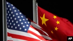 Hoa Kỳ - Trung Quốc cam kết sẽ giữ cho các đường dây liên lạc luôn mở trong lúc đang tìm một hướng ra giữa bối cảnh quan hệ ngày càng căng thẳng.