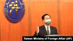تائیوان کے وزیر خارجہ جوزف ووتائپے میں ایک نیوز کانفرنس کے دوران : فوٹو اےپی
