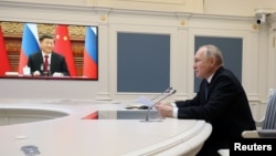 Tổng thống Nga Putin họp qua đường truyền video với Chủ tịch Trung Quốc Tập Cận Bình, 30/12/2022.