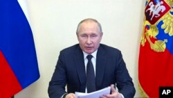 Ảnh chụp màn hình cảnh Tổng thống Nga phát biểu qua đường truyền video, 16/3/2022.