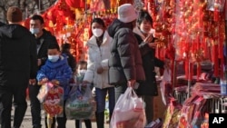 Cư dân Bắc Kinh mua sắm đón Tết Nguyên đán, ngày 7/1/2023.