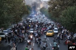 مہسا امینی کی ہلاکت کے خلاف تہران میں ایک مظاہرے کا منظر۔ 21 ستمبر 2022