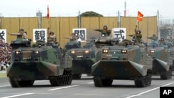 Lực lượng phòng vệ Nhật Bản trong một cuộc diễn hành tại Căn cứ Asaka ở Asaka, bắc Tokyo ngày 14/10/2018.