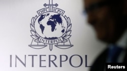 Biểu tượng của tổ chức Cảnh sát Hình sự Quốc tế, Interpol.