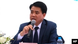 Ông Nguyễn Đức Chung trong một buổi họp báo khi còn tại chức.