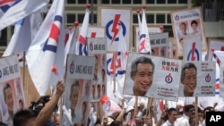 Những người ủng hộ Đảng Nhân dân Hành động (PAP), cổ vũ các nhà lãnh đạo của họ ở trung tâm đề cử, ngày 1/9/2015.