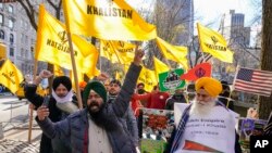 "سکھ فا جسٹس" کا نیو یارک میں بھارتی کسانوں کے حق میں ایک مظاہرہأفوٹو اے پی
