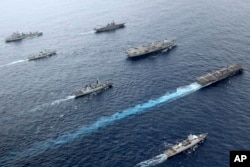 کینیڈا، جاپان اور برطانیہ کے بحری جنگی جہاز بحرہ الکاہل میں مشترکہ گشت کر رہے ہیں۔ ستمبر 2021