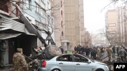 Nơi chiếc trực thăng rơi làm 18 người thiệt mạng ở Kyiv, Ukraine ngày 18/1/2023. 