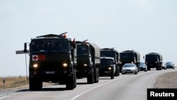 Đoàn xe quân sự của Nga bên ngoài thị trấn Kamensk-Shakhtinsky, vùng Rostov, 16/8/2014.