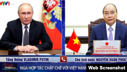 Tổng thống Nga Vladimir Putin và Chủ tịch nước Việt Nam Nguyễn Xuân Phúc. Photo VTV.